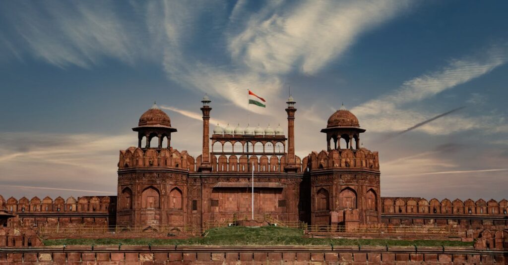 A stunning view of the Red Fort in New Delhi showcasing its historic architecture and Indian flag.