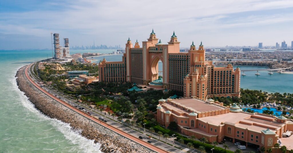 A breathtaking drone shot of Atlantis, The Palm resort in Dubai, highlighting the luxurious urban landscape.